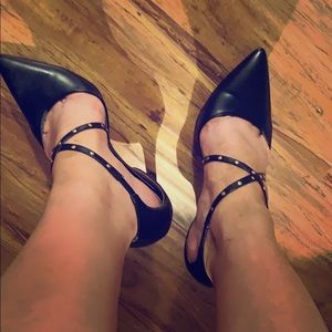 Black stamps studded heels